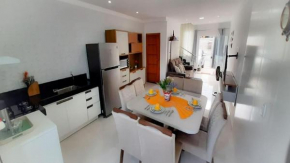 Casa Axé House na praia de Taperapuan com 2 suítes